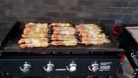 gas-griddle-cooking-food kebabs