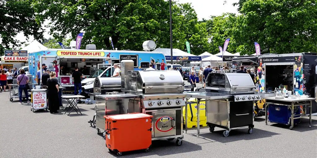 Mobile catering appliances displayed outdoors at an event.